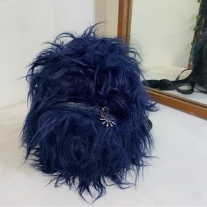 Blue fuzzy backpack